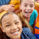 three young children smiling