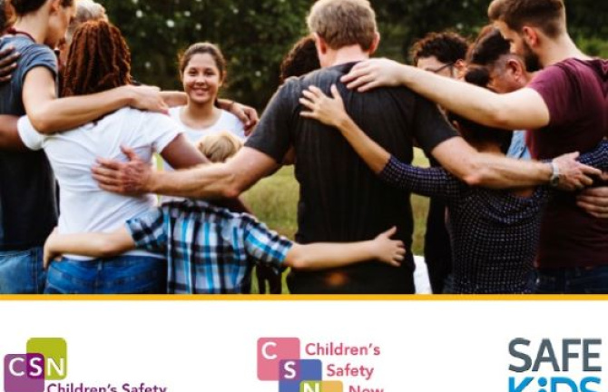 kids in circle with arms around one another