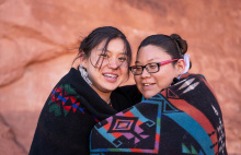 Two tribal young females wrapped in a traditional wrap